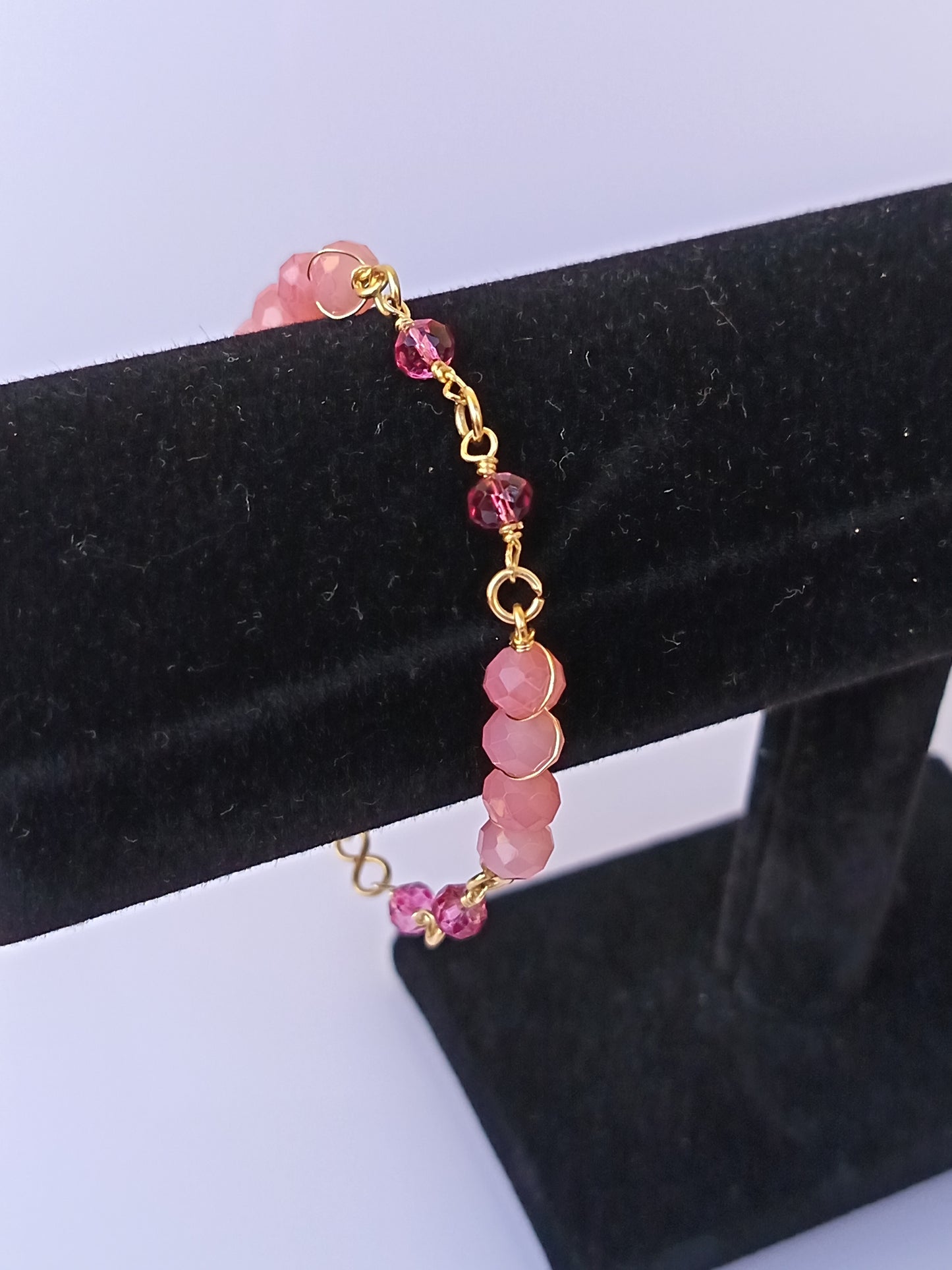 Pulsera nudo de cristales checos rosado