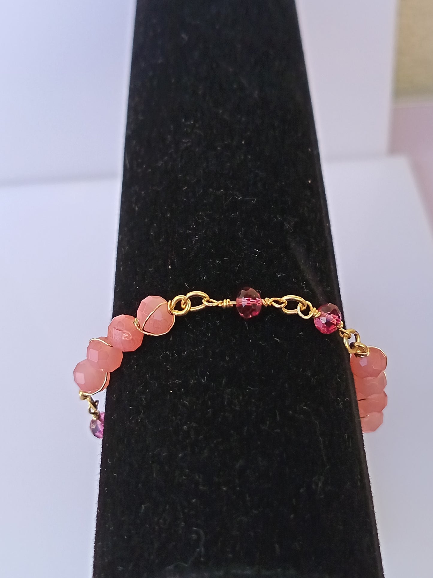 Pulsera nudo de cristales checos rosado